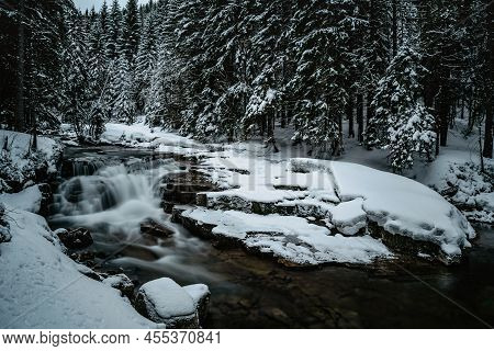 Winter Waterfall And Cascades In Krkonose Mountains Near Spindleruv Mlyn,czech Republic.snowy Frozen