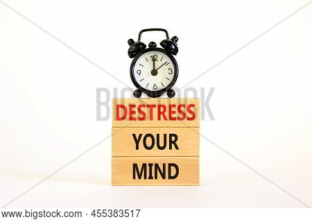 Destress Your Mind Symbol. Concept Words Destress Your Mind On Wooden Blocks. Black Alarm Clock. Bea