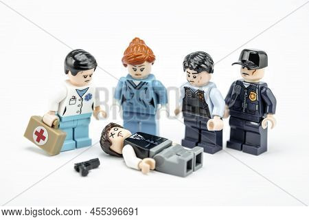 Investigators At Crime Scene With Dead Body. Illustrative Editorial. May 16, 2022