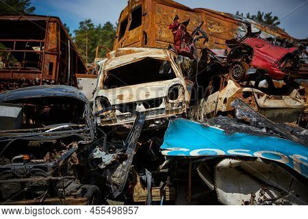 A Lot Of Rusty Burnt Cars In Irpen, After Being Shot By The Russian Military. Russias War Against Uk