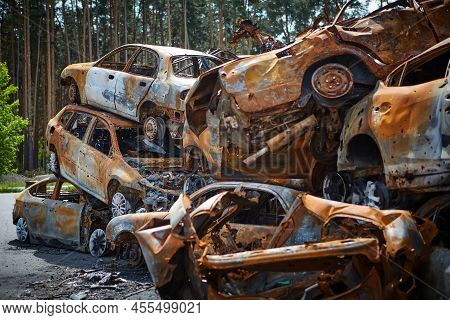 A Lot Of Rusty Burnt Cars In Irpen, After Being Shot By The Russian Military. Russias War Against Uk