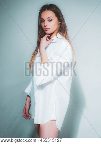Cheerful Woman With Blonde Hair Wearning Stylish Casual. Portrait Of A Beautiful Girl In Studio.