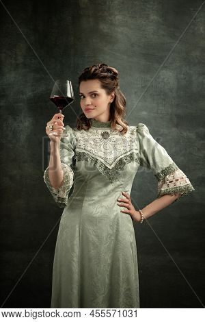 Conceptual Portrait Of Young Charming Girl In Image Of Medieval Royal Person Or Viscountess Posing I