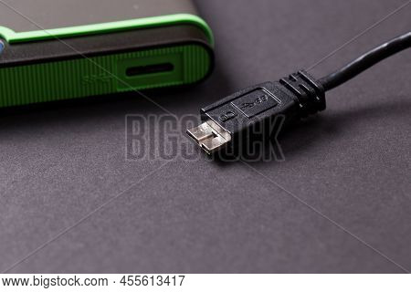 Hard Disk On A Black Isolated Background Close-up.