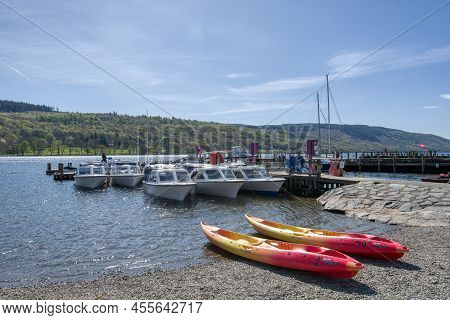 Coniston, United Kingdom - 21st April 2022 : A View Of Rowing Boats At Coniston Water