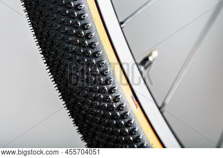 Shallow Tread Of A Bicycle Tubeless Tire With A Brown Sidewall