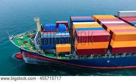 Aerial Side View Of Cargo Ship Carrying Container And Running For Export  Goods  From  Cargo Yard Po