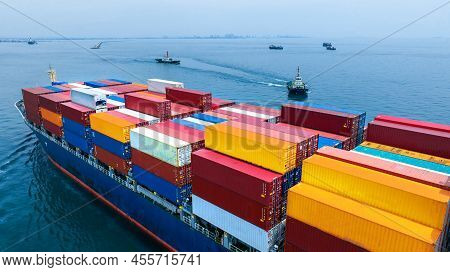 Aerial Side View Of Cargo Ship Carrying Container And Running For Export  Goods  From  Cargo Yard Po