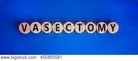 Vasectomy Symbol. Concept Words Vasectomy On Wooden Circles. Beautiful Blue Table Blue Background. M