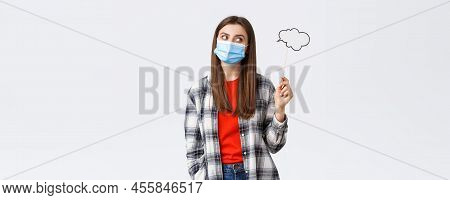 Coronavirus Outbreak, Leisure On Quarantine, Social Distancing And Emotions Concept. Thoughtful Smar