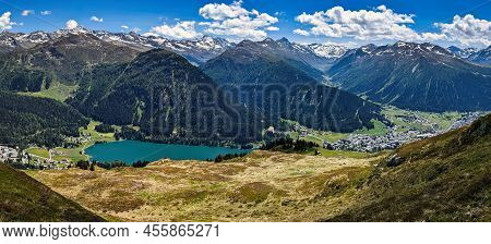 Panoramic View Of Lake Davos. Fantastic Mountains In Spring. Hiking, Trail Running, Mountain Biking.