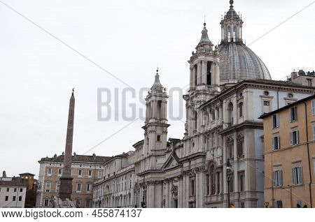 Piazza Navona Architecture With Obelisco Agonale And Sant Agnese Church Famous Landmark In Rome, Ita