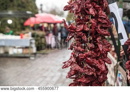 Selective Blur On Dried Red Peppers Drying, For Sale On A Market Of Serbia. Peppers Are A Vegetal Ty