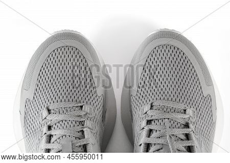New Unbranded Running Sneaker Or Trainer Isolated On White Background. Men's Light Grai Sport Footwe