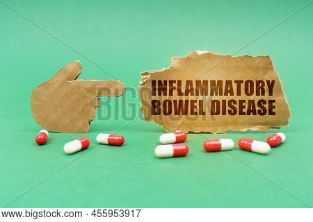 Medical Concept. On The Green Surface Of The Tablet And A Hand Pointing To A Sign With The Inscripti