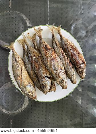 Photo Of Fried Tamarong, Matambaka, Mackerel Scad  Or Decapterus Macarellus Served On A Plate Which 