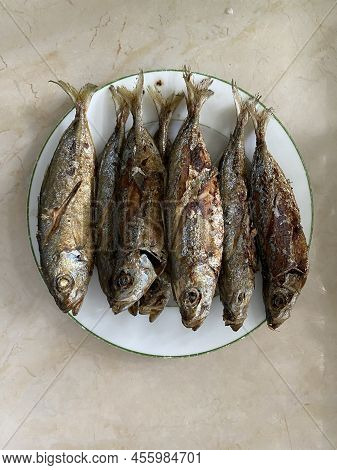 Photo Of Fried Tamarong, Matambaka, Mackerel Scad  Or Decapterus Macarellus Served On A Plate Which 