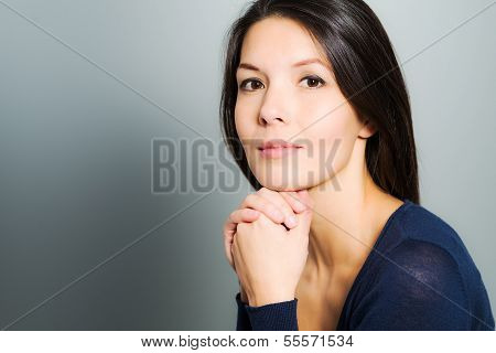 Thoughtful Attractive Woman With A Serene Face