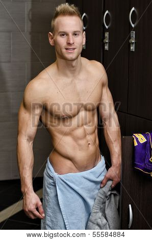 Shirtless Muscular Young Male Athlete In Gym Dressing Room