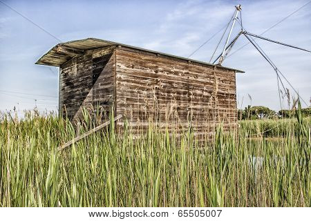 Fishing Shack On Sea Channel