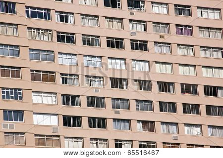 Closeup Hi-rise Apartment Complex With Brown Facade