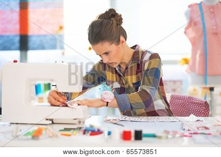 Seamstress Working In Studio