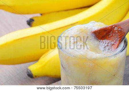 Smoothie Banana On Wood Background