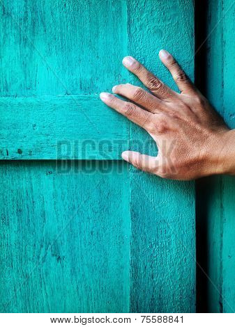 Hand Opens A Blue Window