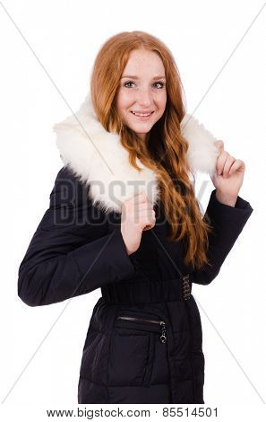 Pretty girl in warm clothes isolated on white