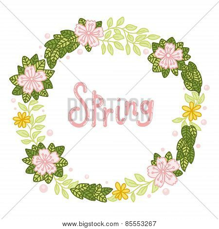 Floral wreath with leaves and flowers, good for invitations and cards.