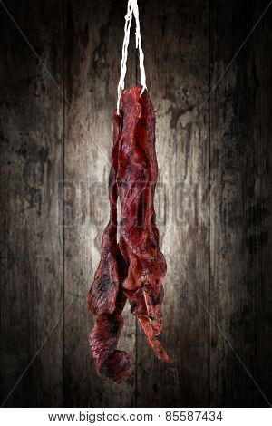 jerky beefi on a wooden background