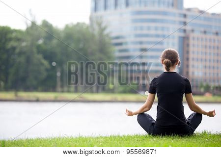 Young Office Woman Sitting In Yoga Pose