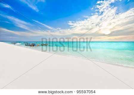Boats on the beach at sunrise time
