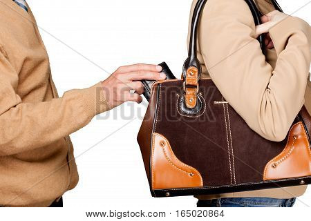 Pick pocket taking a wallet from a purse