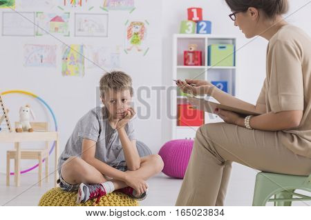 Child Having Conversation With Psychotherapist