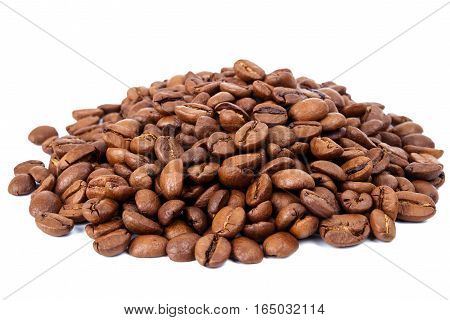 Pile of roasted coffee beans isolated in white background selective focus on the center