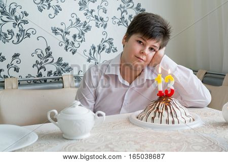 Upset teenager alone marks the 13th birthday