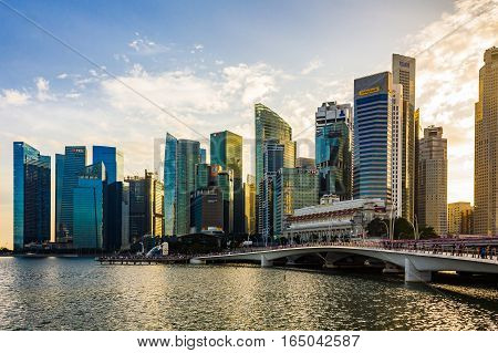 Singapore - January 07 2017: Singapore Cityscape Financial building with Dramatic Cloud in Marina Bay area Singapore Golden Hour Urban Dusk