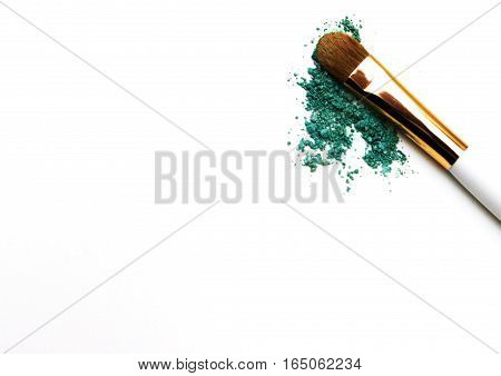Makeup highlighter, make-up on Valentine's Day, shadow and brushes for make-up, make-up artist for the tools.