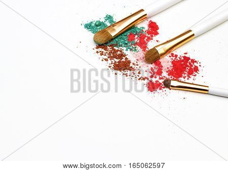 Makeup highlighter, make-up on Valentine's Day, shadow and brushes for make-up, make-up artist for the tools.
