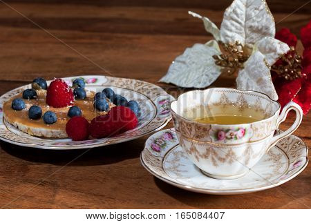Cup Of Tea, Sauser, Rice Cracker With Peanut Butter, Berries And Honey On The Wooden Table