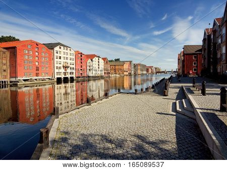 Trondheim, Nidaros historical name - the third most populous city in Norway, is situated at the mouth of the river Nidelva Trondheim fjord, colorful wooden houses along the banks of the fjord.
