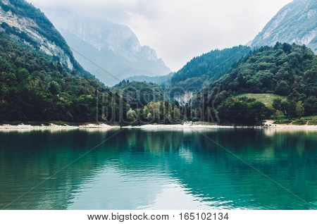 Lago di Tenno - lake with turquoise water in Tenno Trentino Italy.