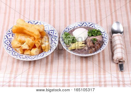 Red Brown Rice , Porridge With Mined Pork And Chicken Lever .