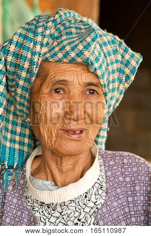 Minnanthu Myanmar - 24 January 2010: Portrait of an old woman at the archaeological site of Bagan on Myanmar