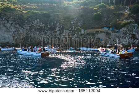 Capri Italy - October 20 2008: Tourists on the boats waithing to enter in the Grotta Azzurra sea cave