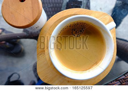 Cup of hot coffee. Hot tasty americano in white mug