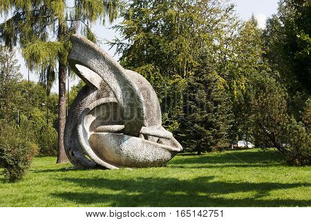 ZAKOPANE POLAND - SEPTEMBER 14 2016: Made of reinforced concrete the sculpture is called the Orbita. This 17 meter high sculpture is located at the park at the town hall