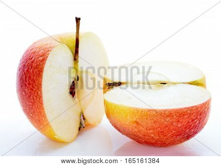 Wet, Sliced Apples Isolated On White Background
