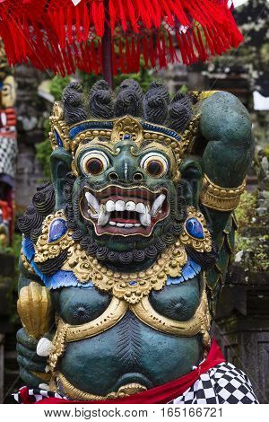 Close up of traditional Balinese God statue in Central Bali temple. Indonesia